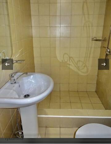 Стандартный четырехместный номер в Гостевом доме Абхазский Дворик , отдельно стоящие двухномерные домики